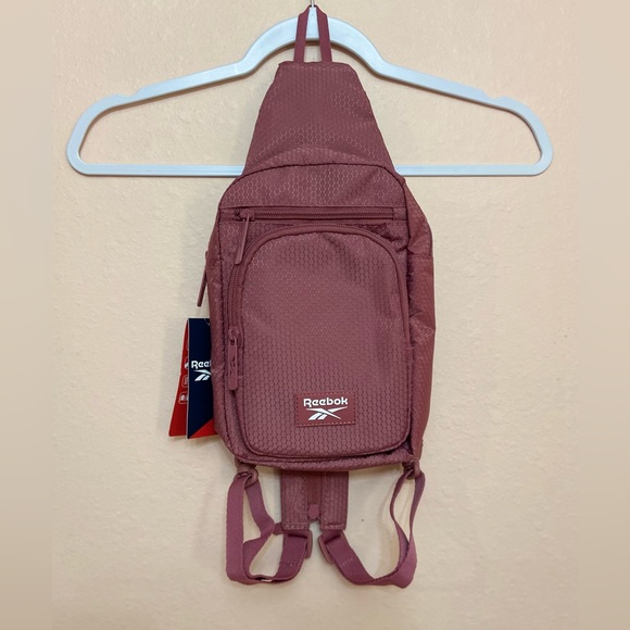 Reebok Handbags - Reebok Cosmos Crossbody bag